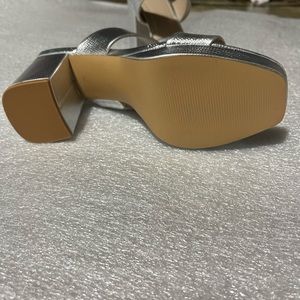 BP. Shoes . New. Never worn. Size 7. Silver.